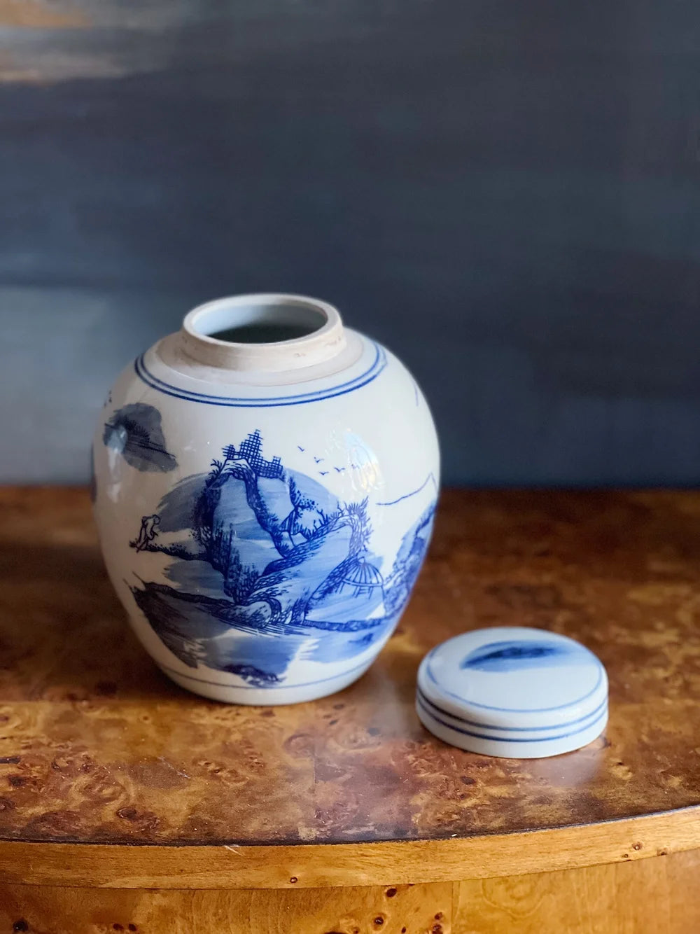 blue and white ginger jar with landscape design