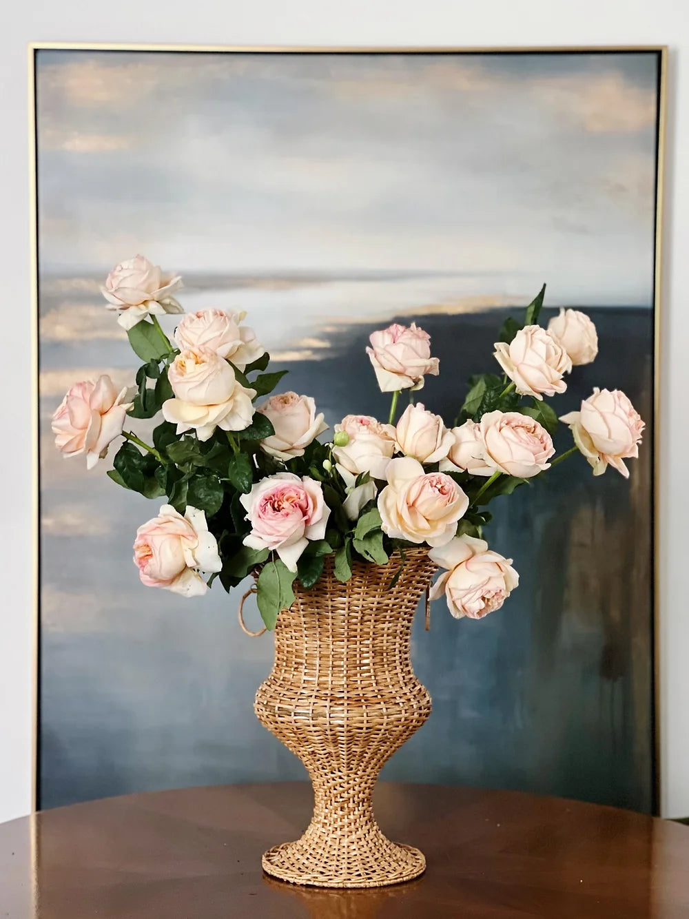 wicker urn and pink roses