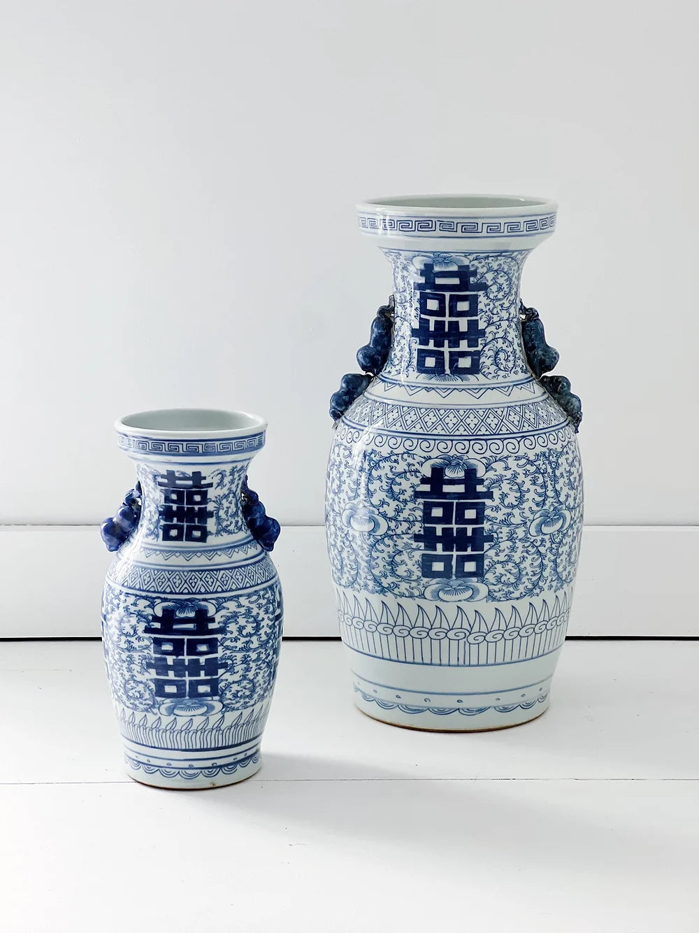 blue and white double happiness vases, large and small