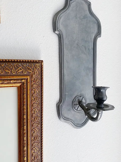 antique pewter sconce and vintage art