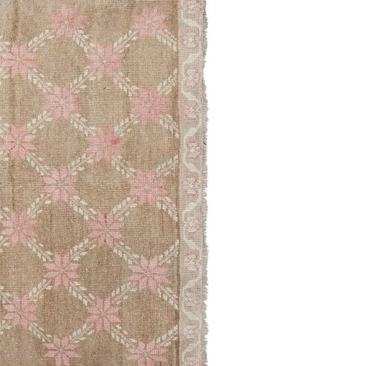 pink and tan vintage oushak rug