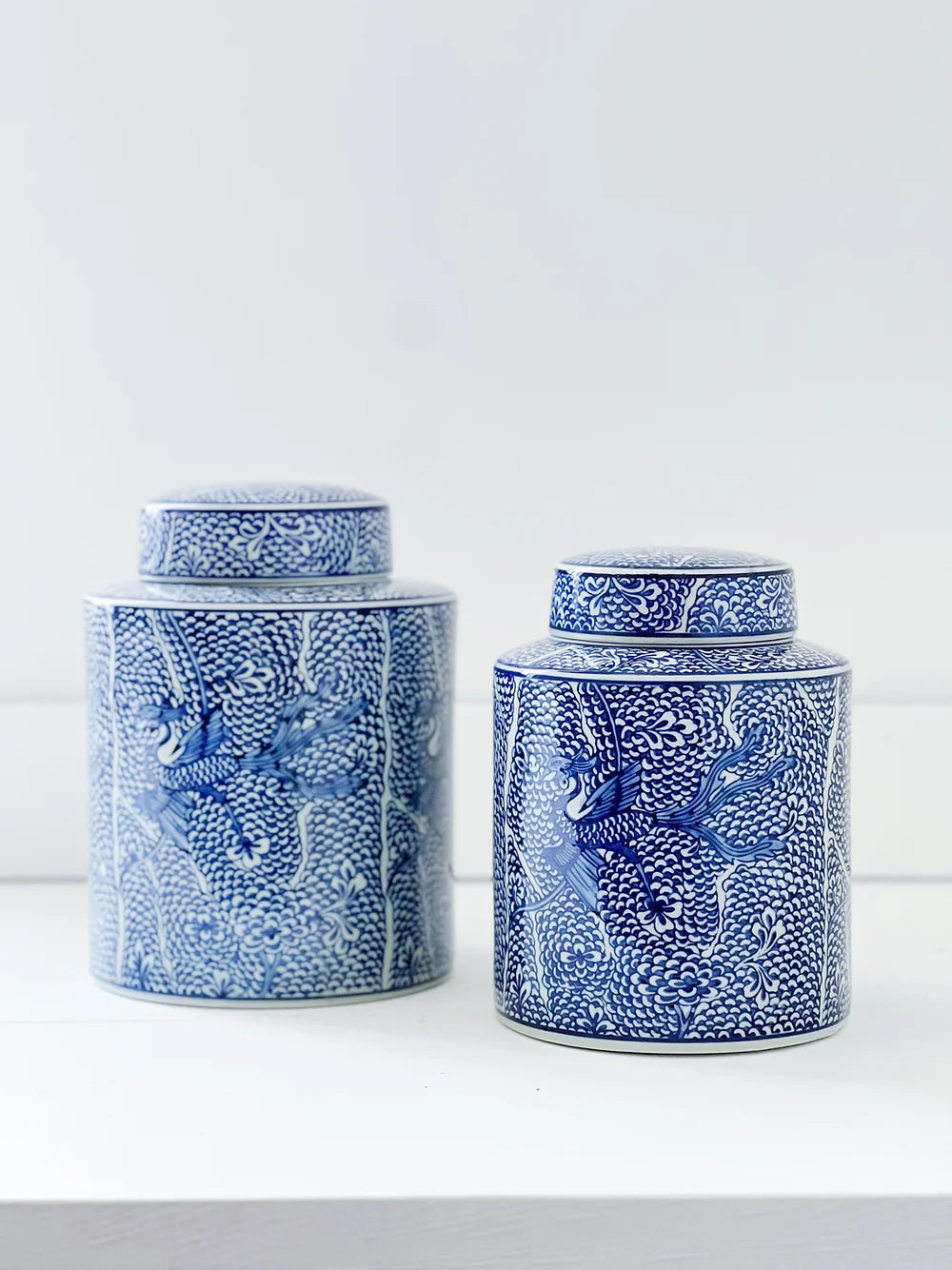 set of blue and white koi fish ginger jars