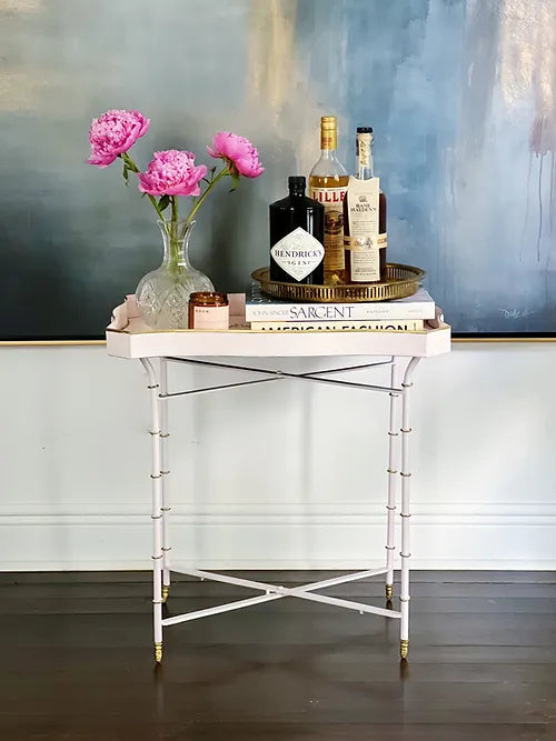 pink and gold tole butler tray table used as a bart cart with pink peonies