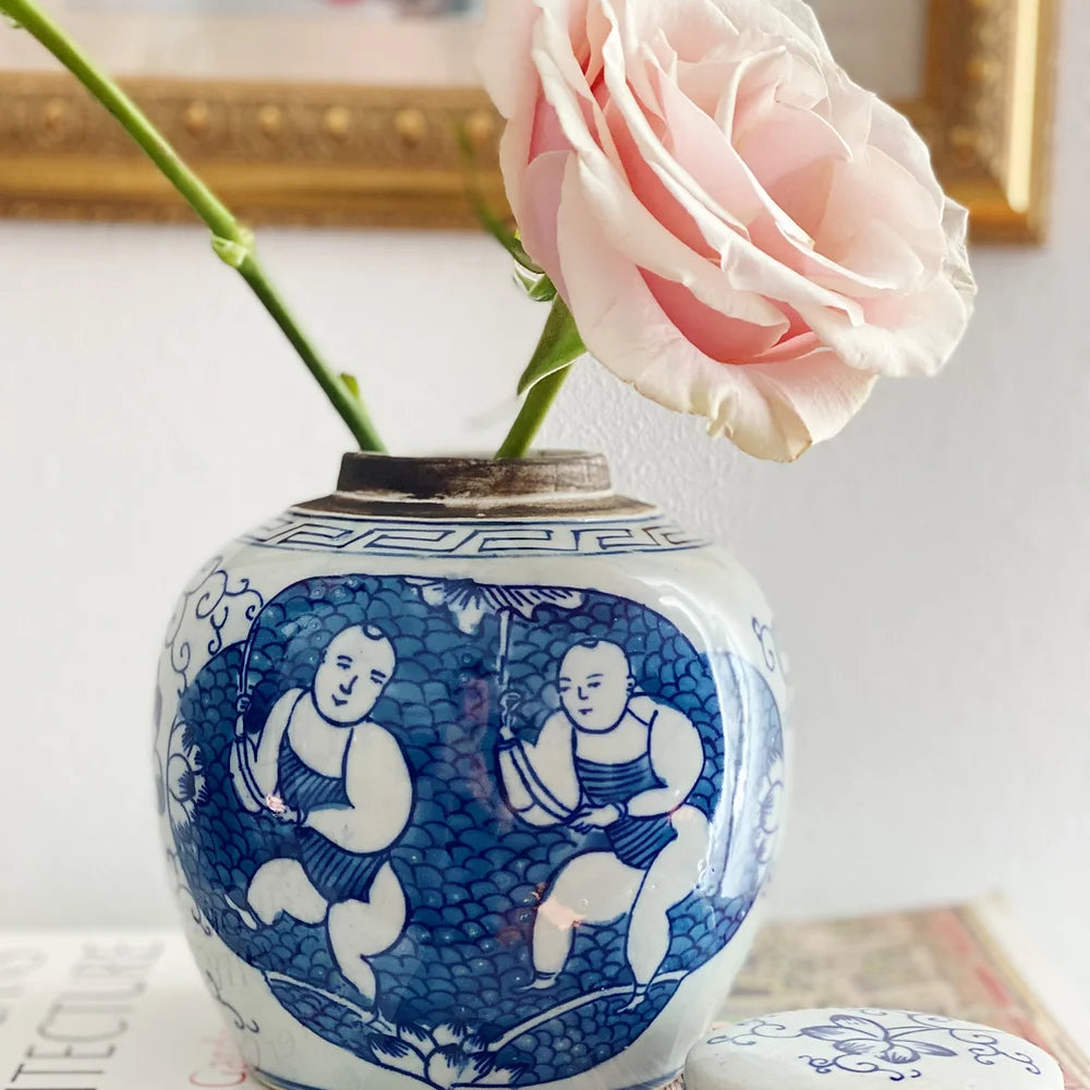 blue and white ginger jar with pink roses