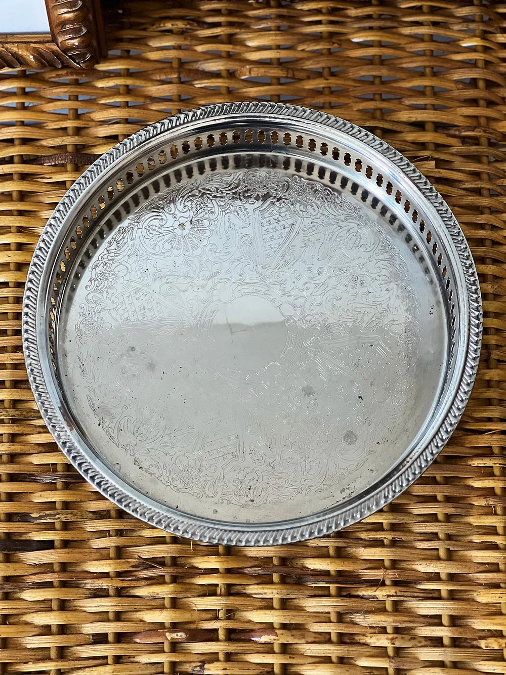 small vintage silver serving tray on wicker