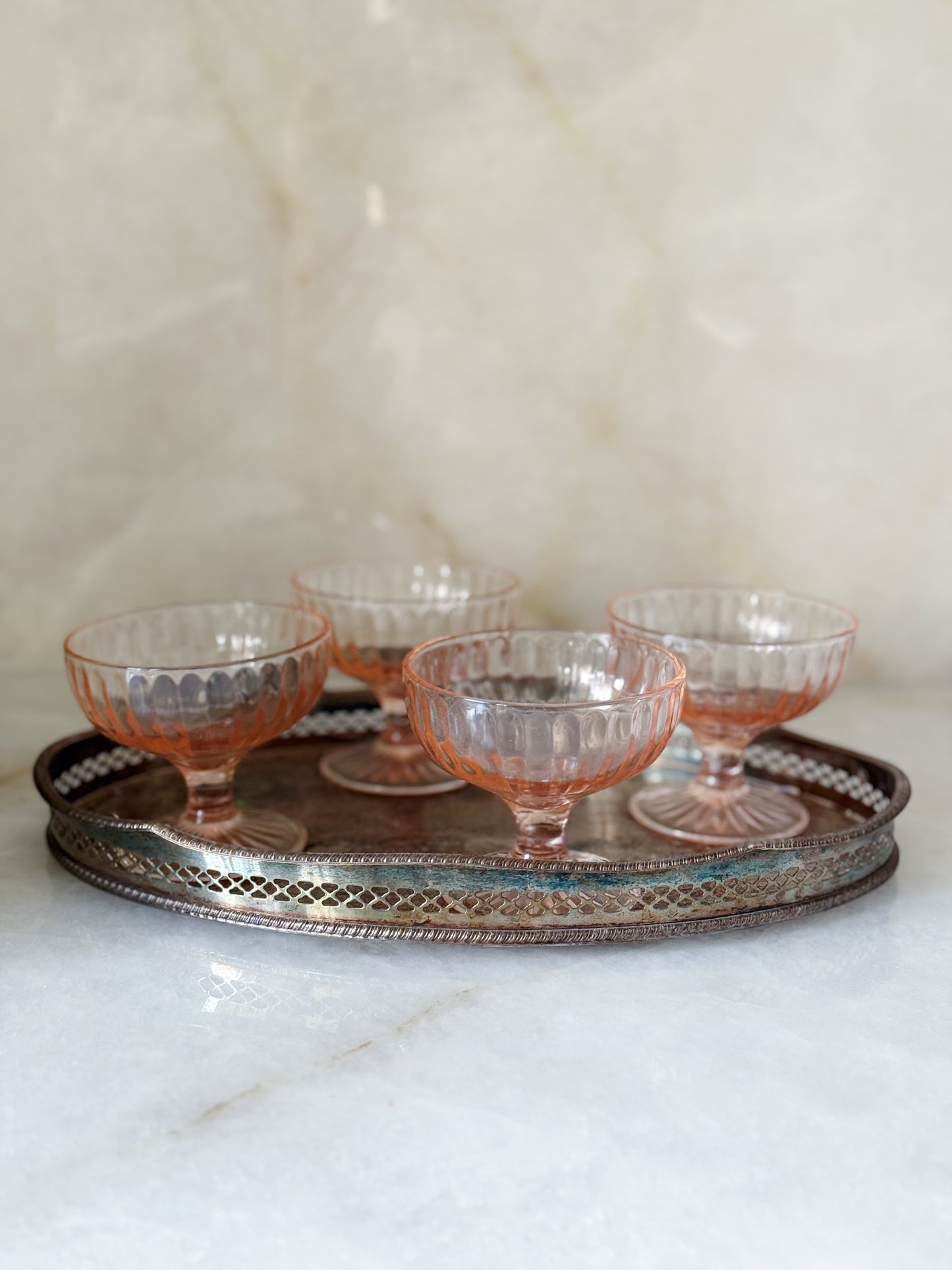 Vintage pink depression champagne coupes
