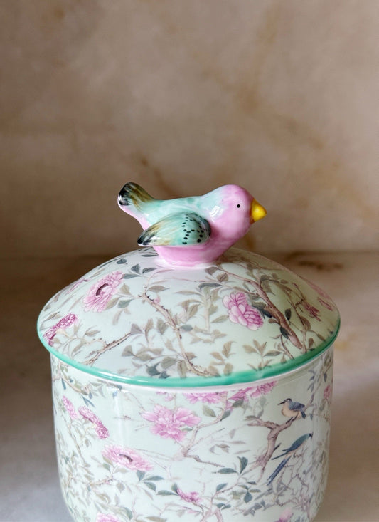 Close-up of the bird finial on the lidded box