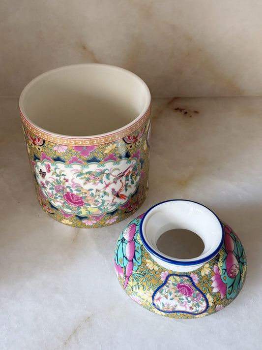 Close-up of the rose medallion pattern on the tissue box holder