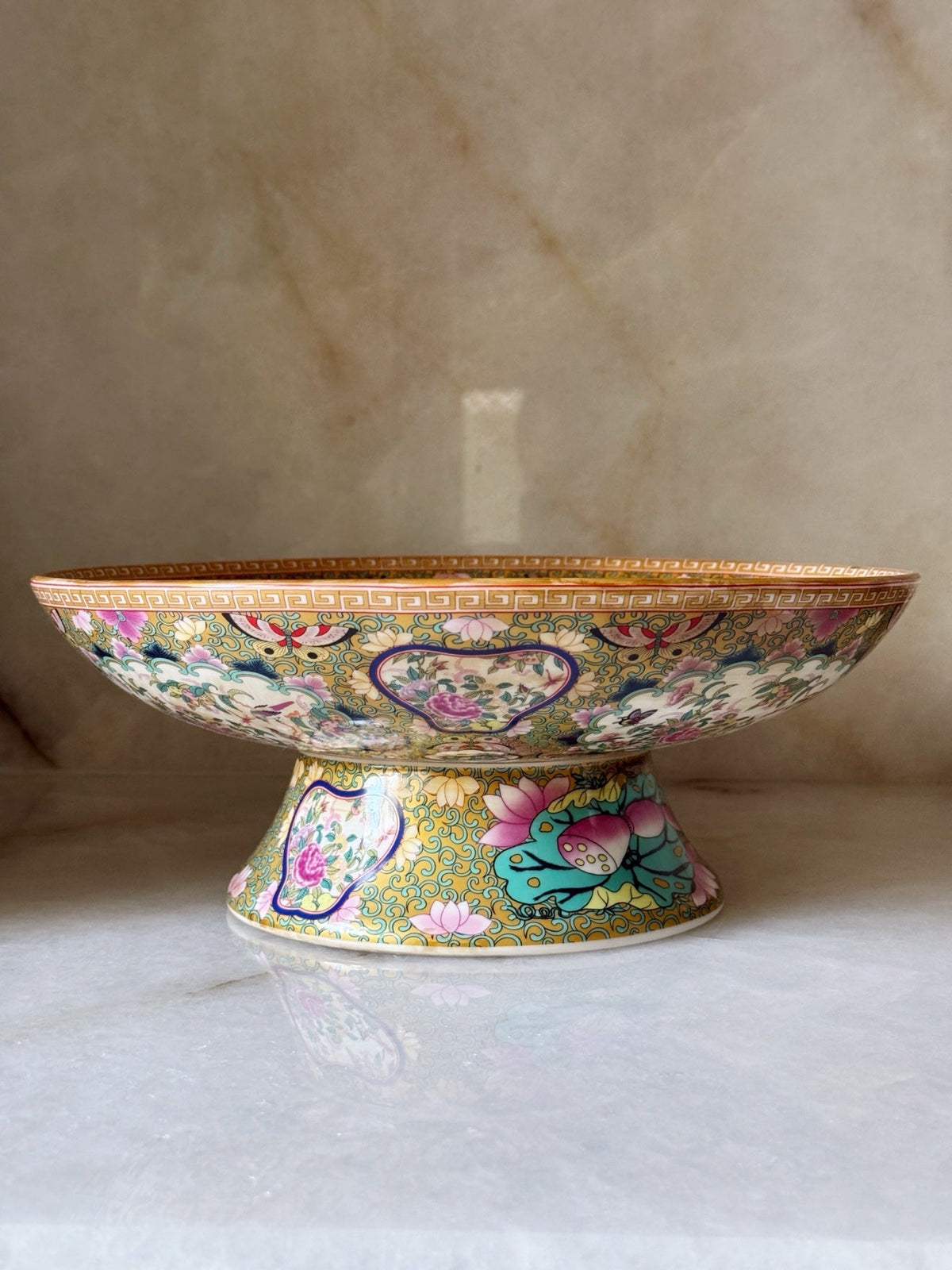 Side view of the rose medallion pedestal bowl showing the exterior pattern