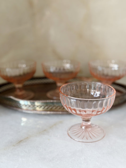 Vintage pink depression champagne coupes