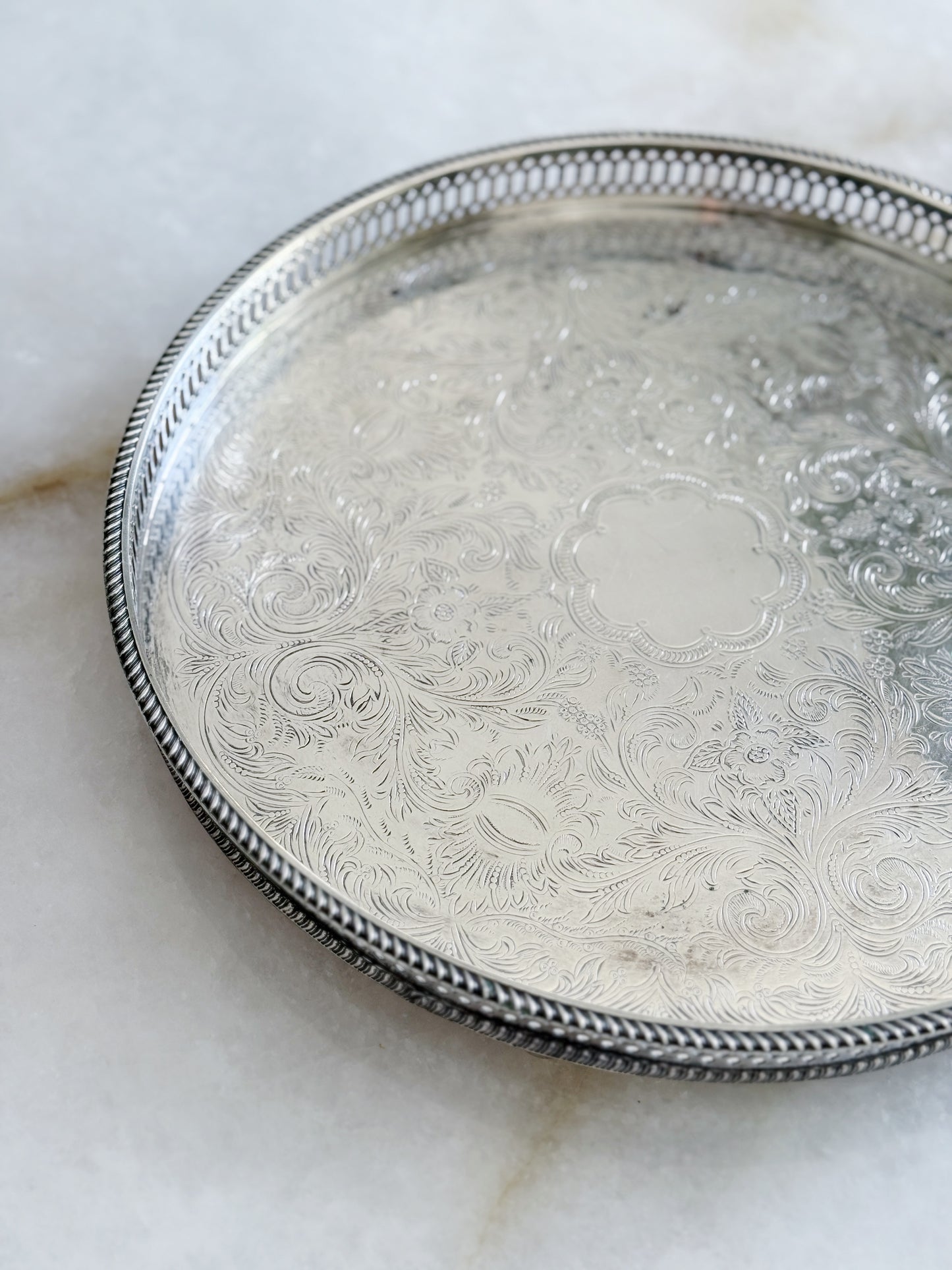 Footed vintage silver serving tray with reticulated edges