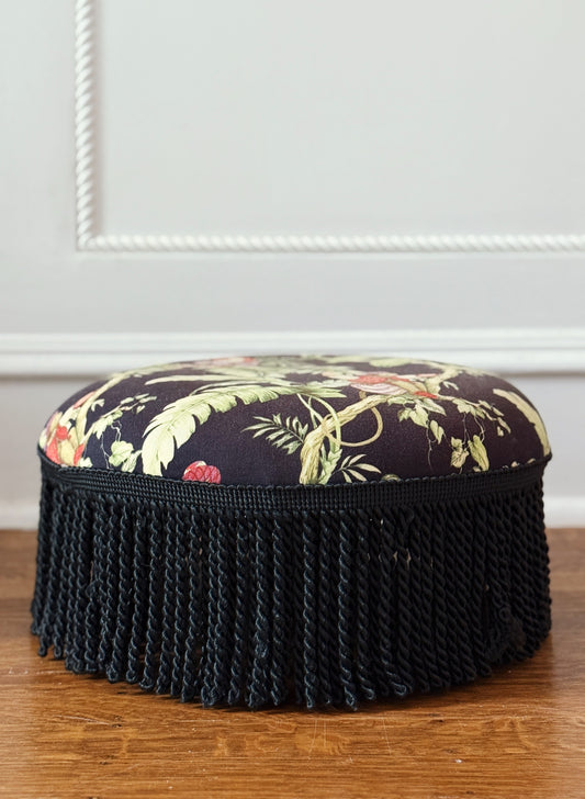Vintage furniture upholstered foot stool with tassel trim