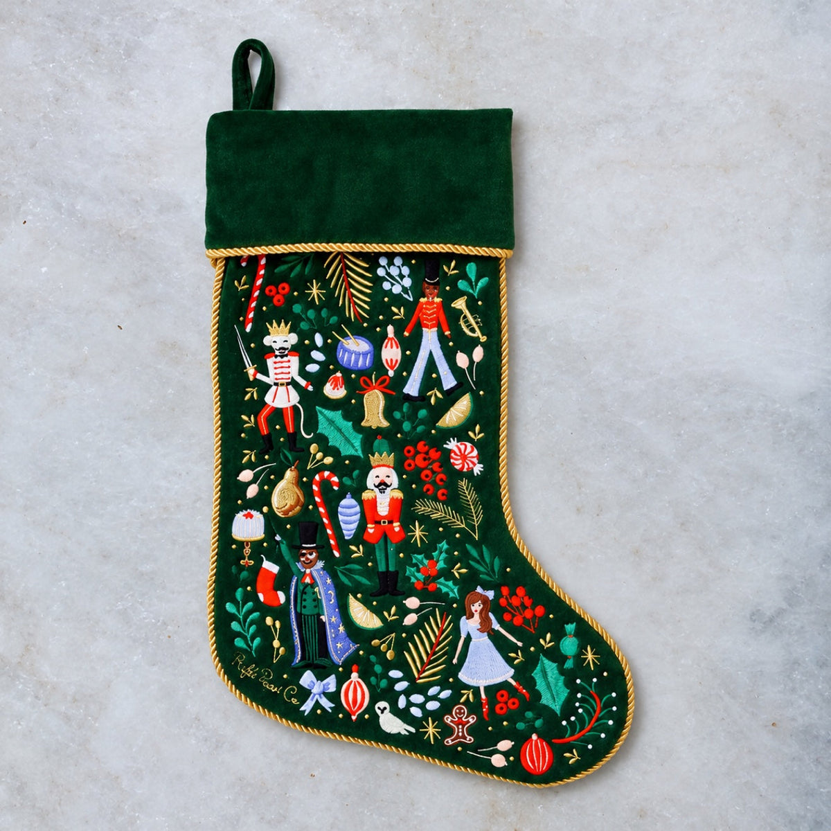 Nutcracker embroidered Christmas stocking in green velvet