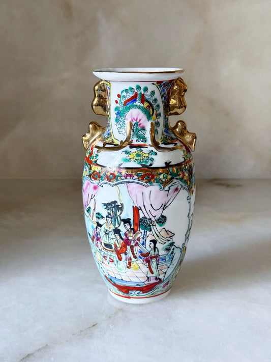 Vintage hand-painted famille rose porcelain vase with gilt handles, front view