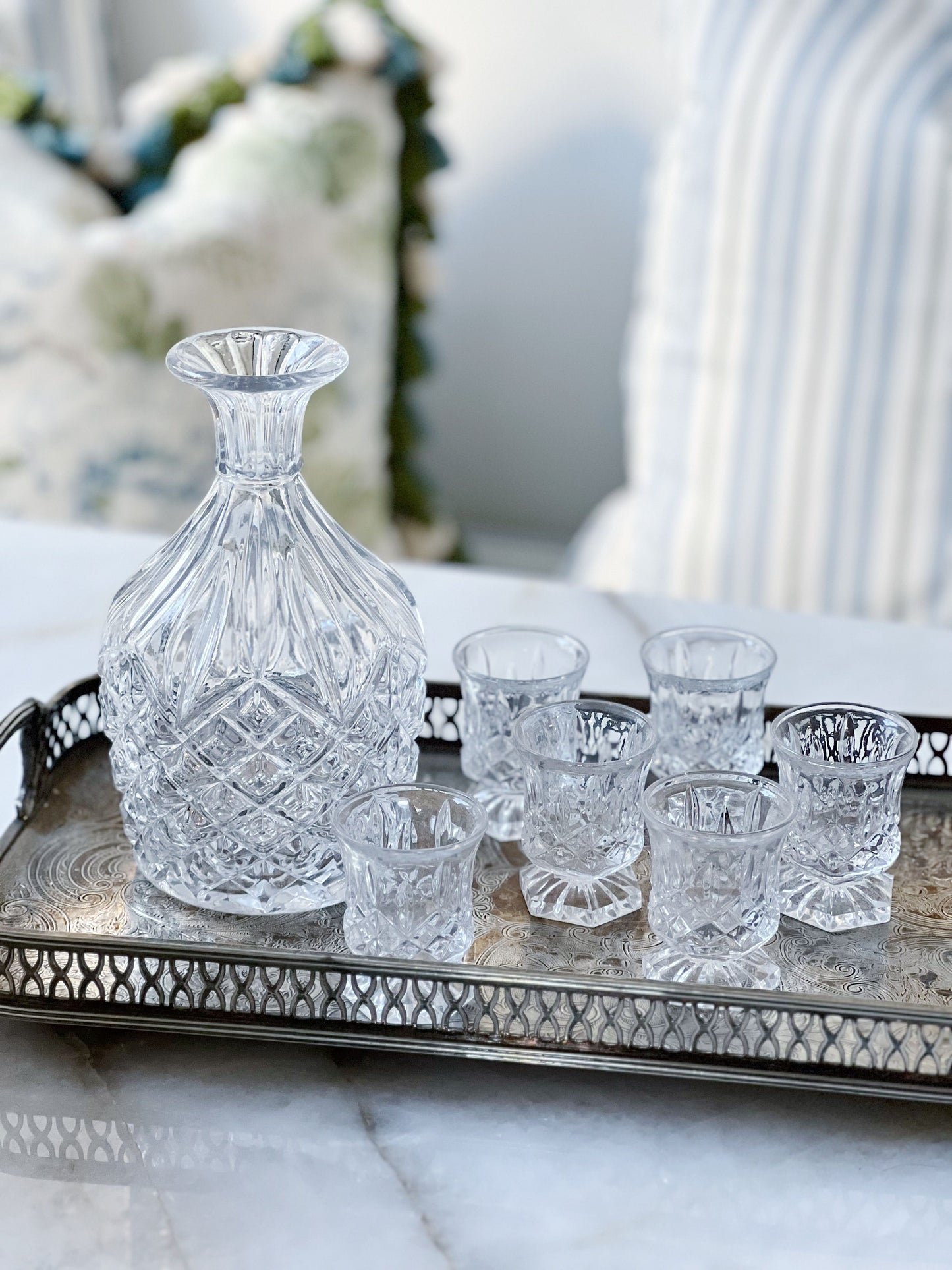 vintage decanter and cordial glasses set on a vintage serving tray
