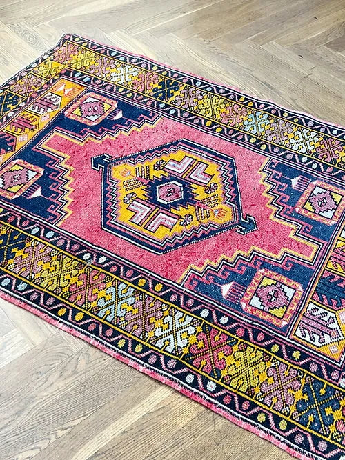 vintage Turkish oushak rug in pinks 