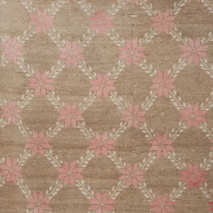 pink and tan vintage oushak rug