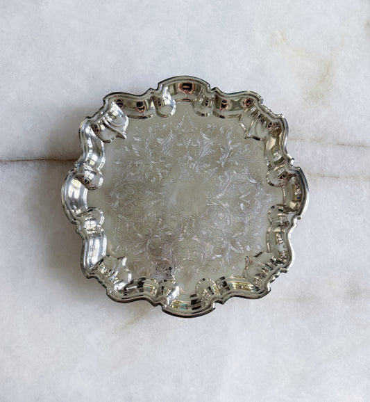 Vintage silver serving footed tray with embossed design