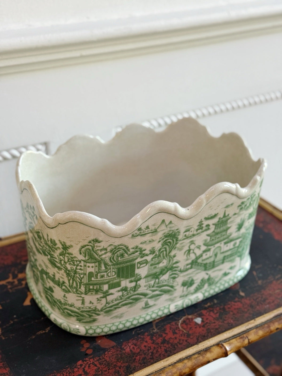 Green willow porcelain planter showing the scalloped rim and interior
