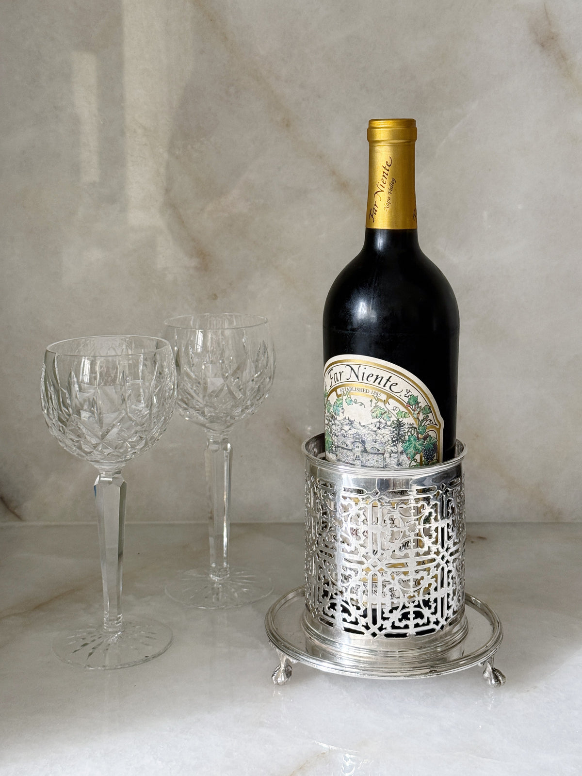 Vintage Silverplate Reticulated Wine Bottle Holder With vintage Waterford wine hock glasses 