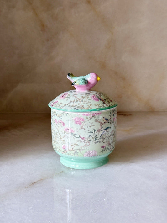 Green songbird floral porcelain lidded box, front view