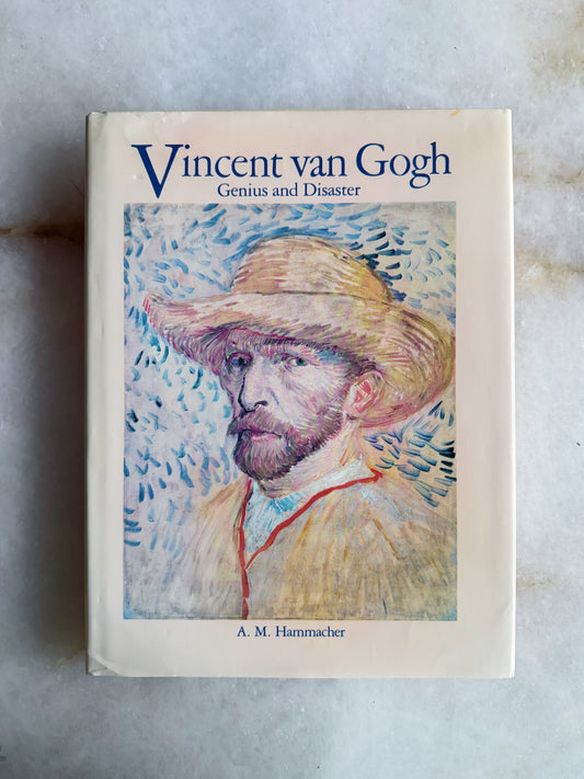 Vintage coffee table Book titled 'Vincent van Gogh: Genius and Disaster' by A. M. Hammacher on a textured surface