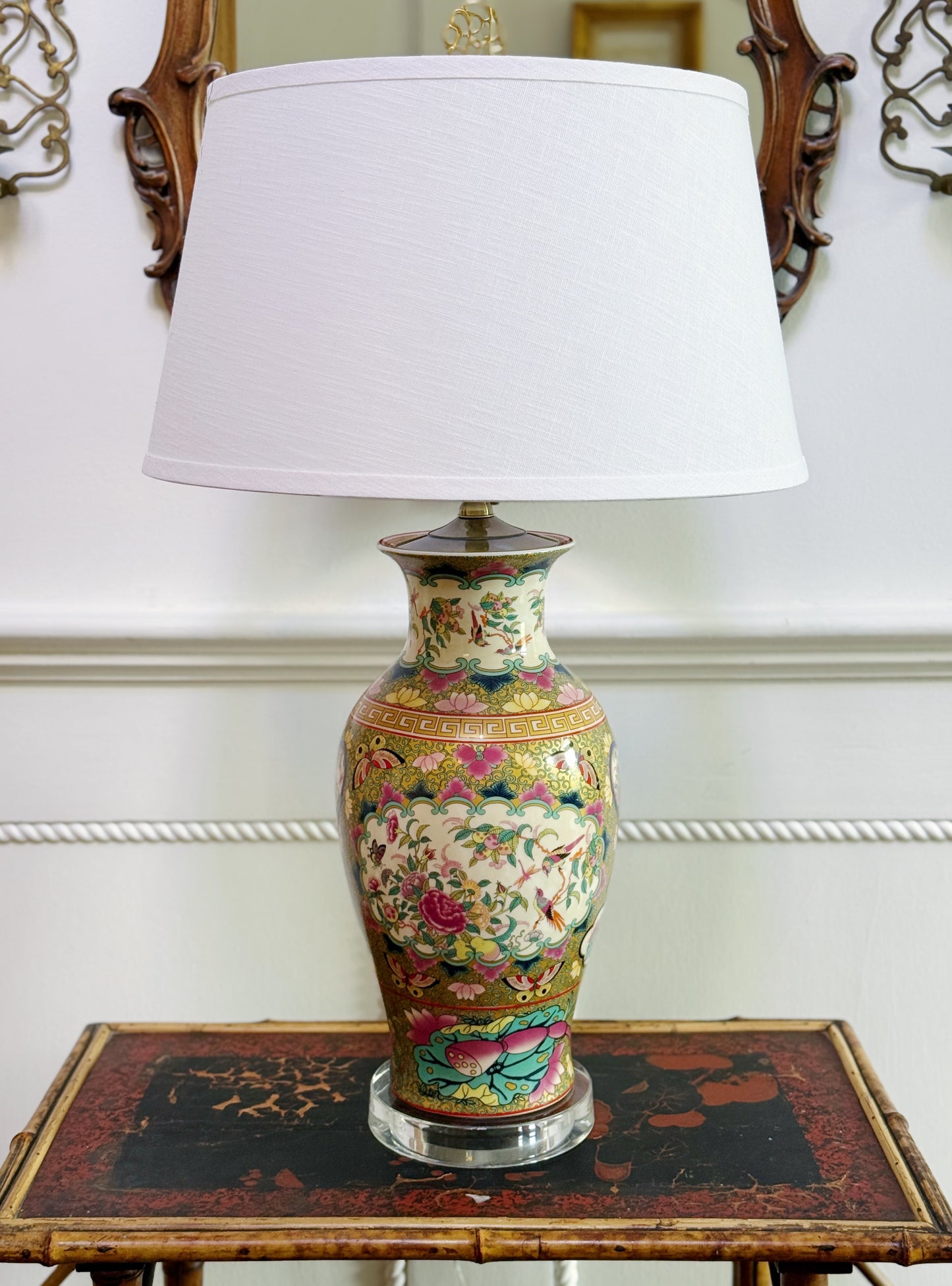 Decorative lamp with floral patterns on a wooden table