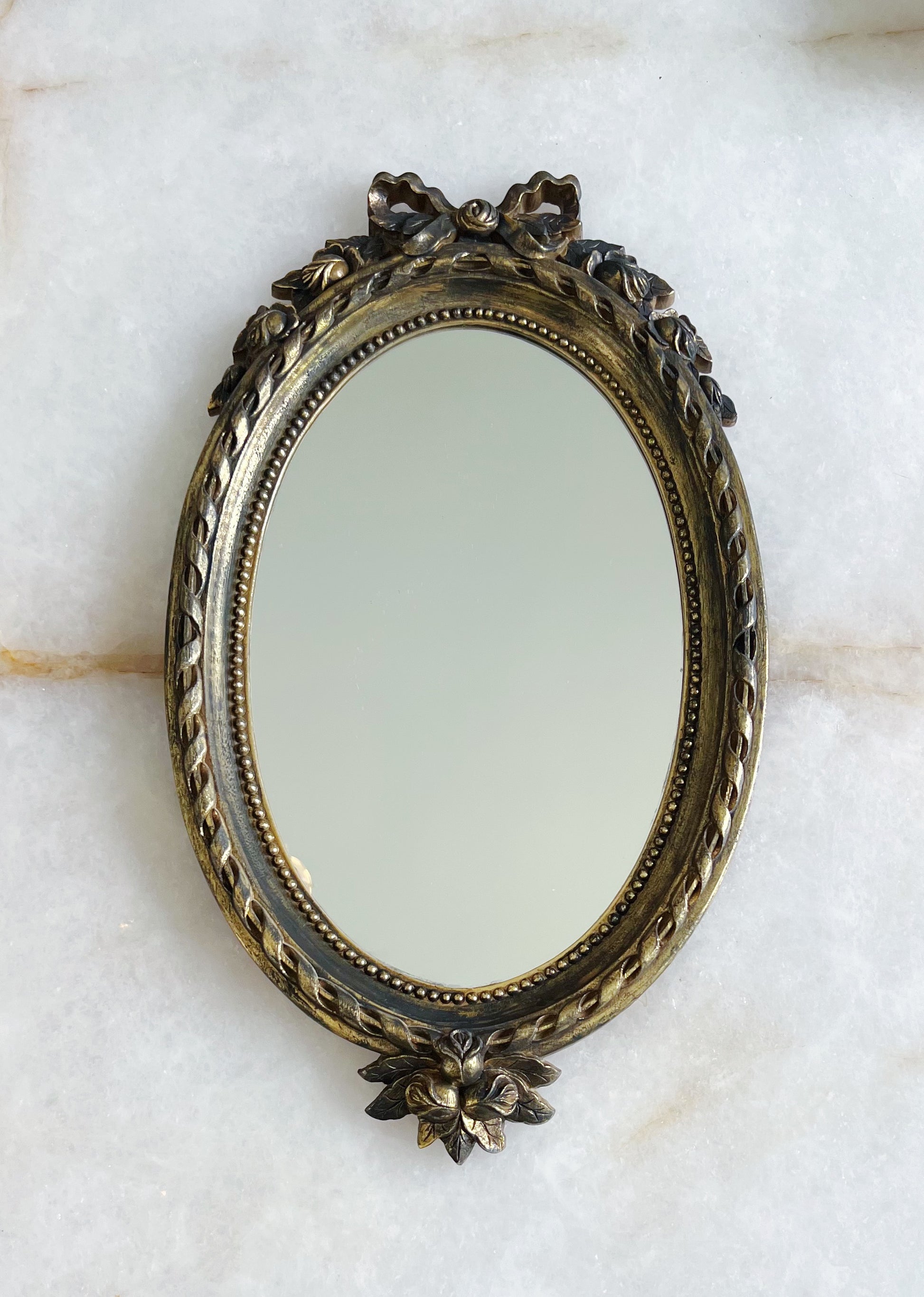 Vintage gold bow mirror 