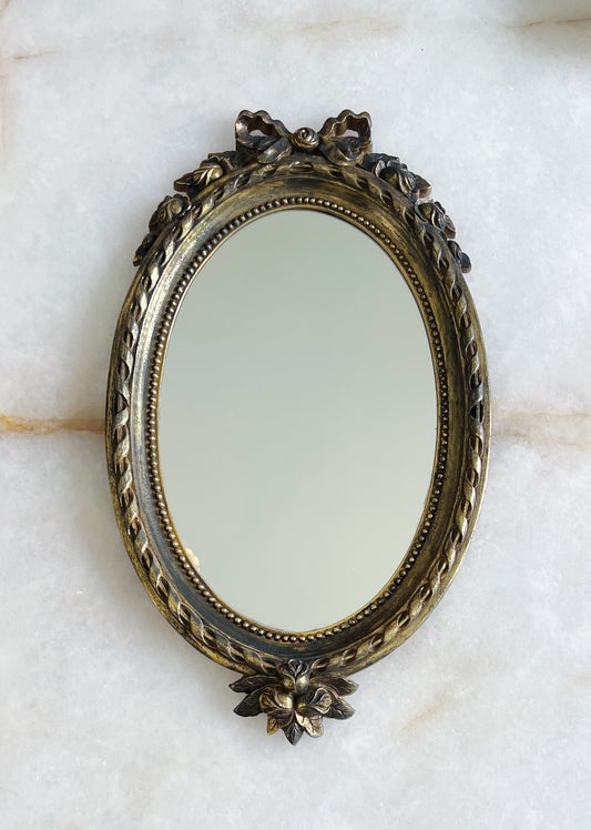 Vintage gold bow mirror 