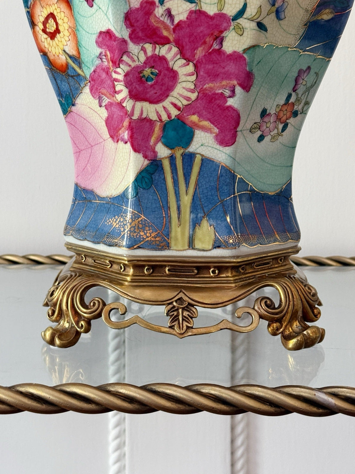 Close-up of the bronze ormolu base on the tobacco leaf temple jar