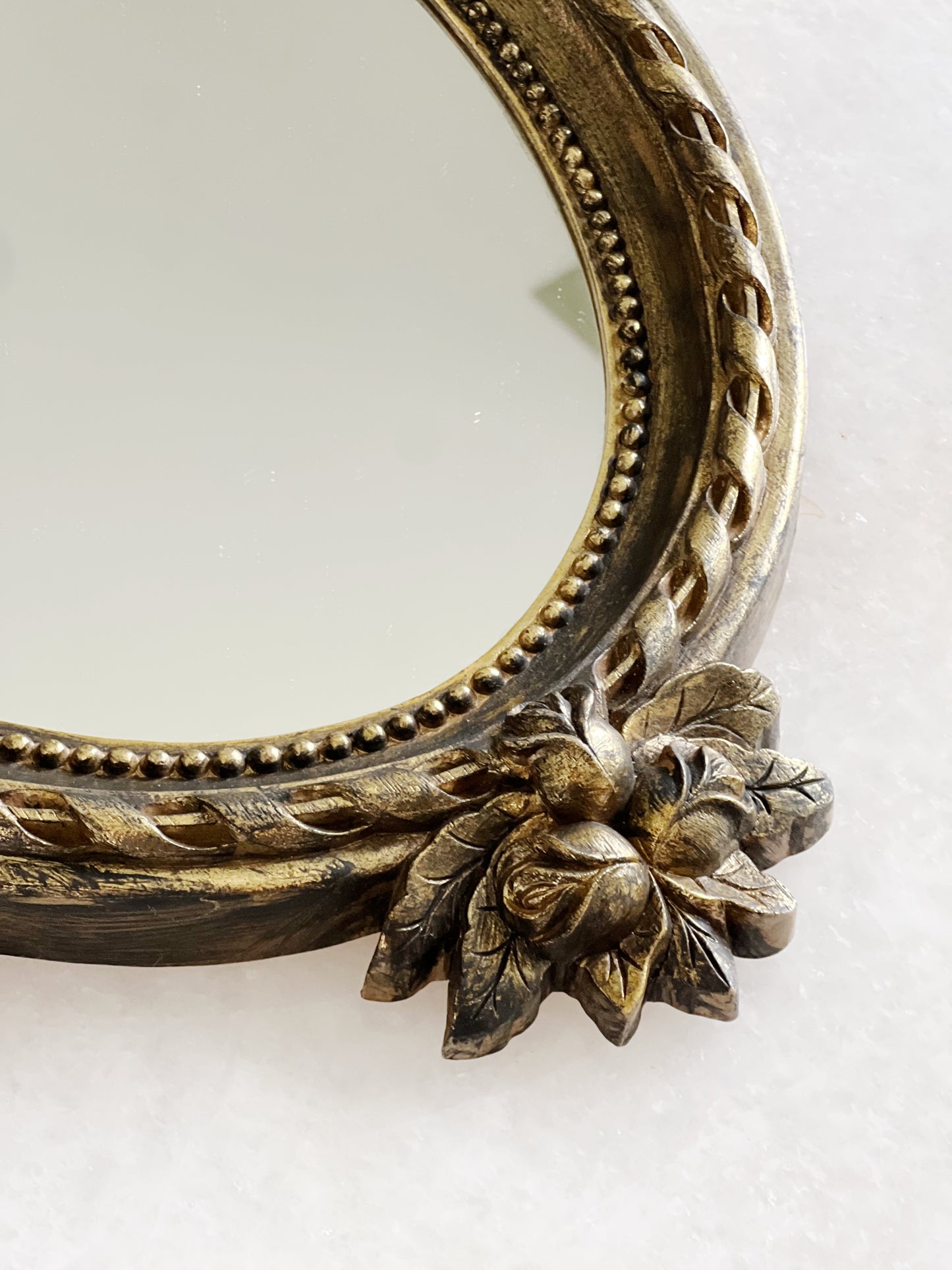Vintage gold bow mirror