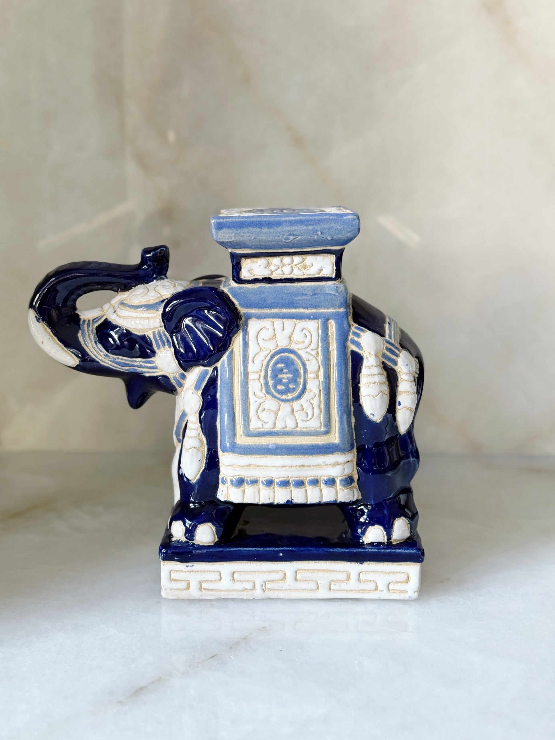 Vintage blue and white elephant plant stand 