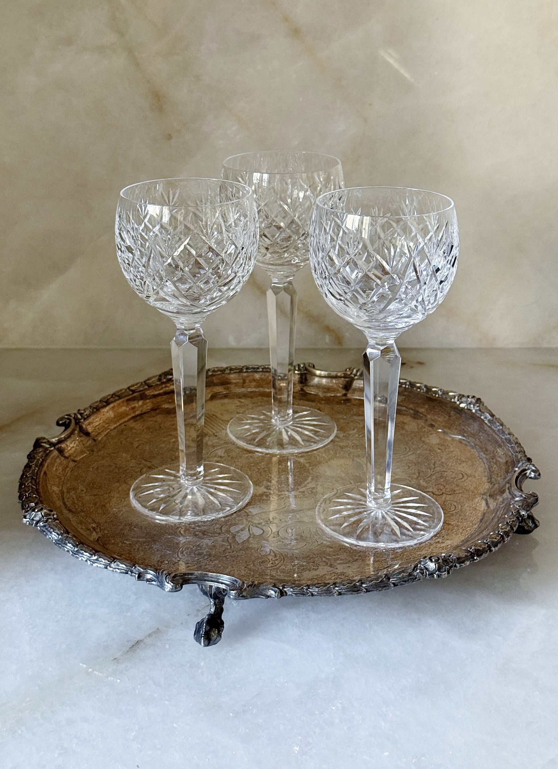 Vintage Waterford Donegal Cut Crystal Hock Wine Glasses – Set of 3 on a vintage silver serving tray