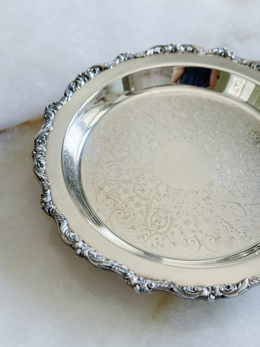 Vintage footed silver serving tray with etched design