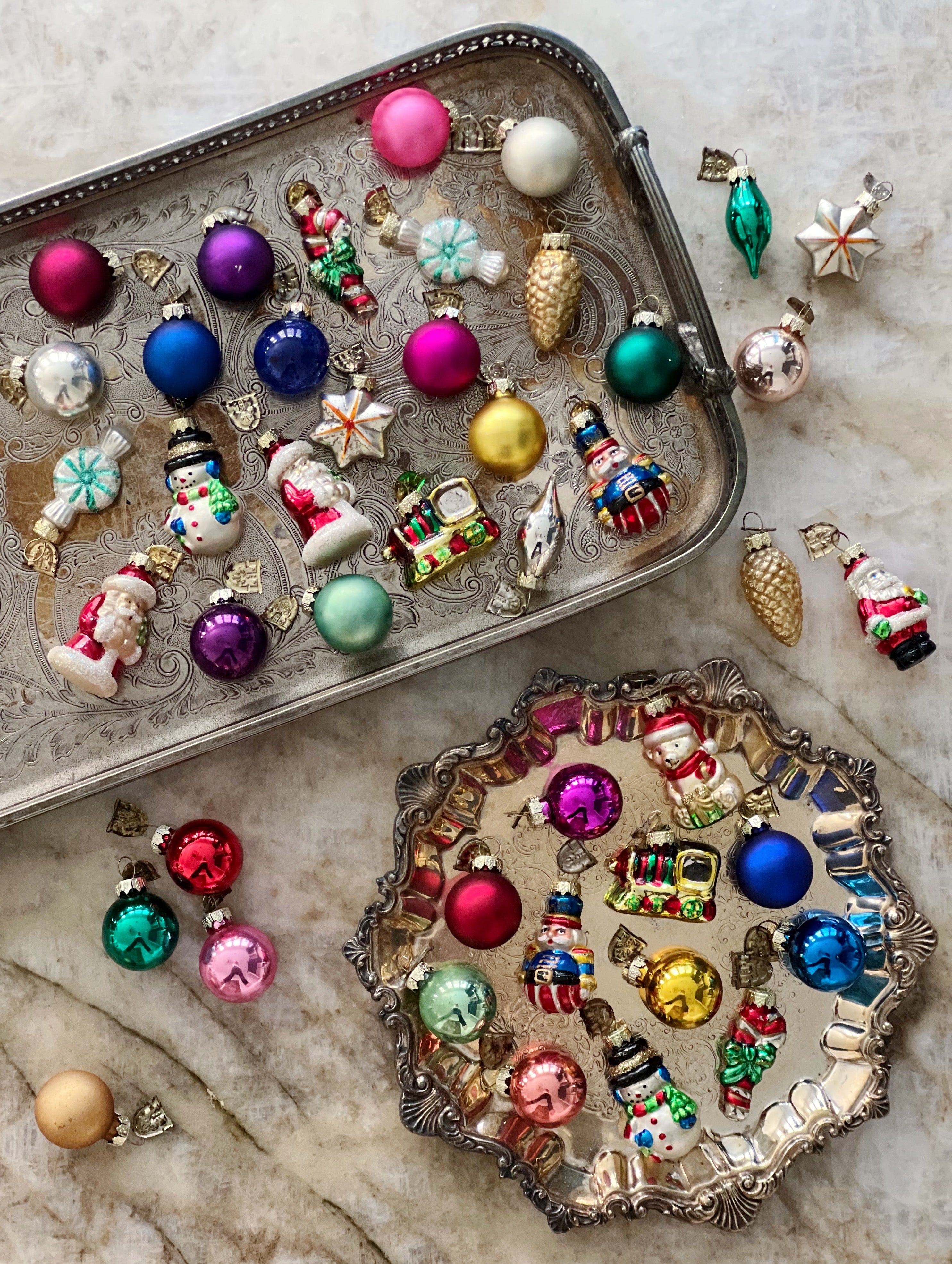 vintage glass christmas ornaments on vintage silver trays 