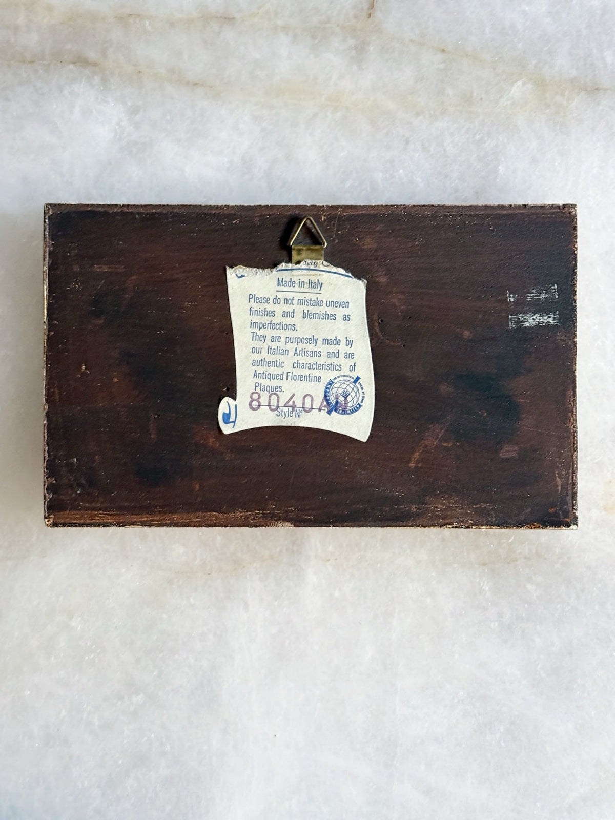 Back of the Florentine plaque showing its Made in Italy label