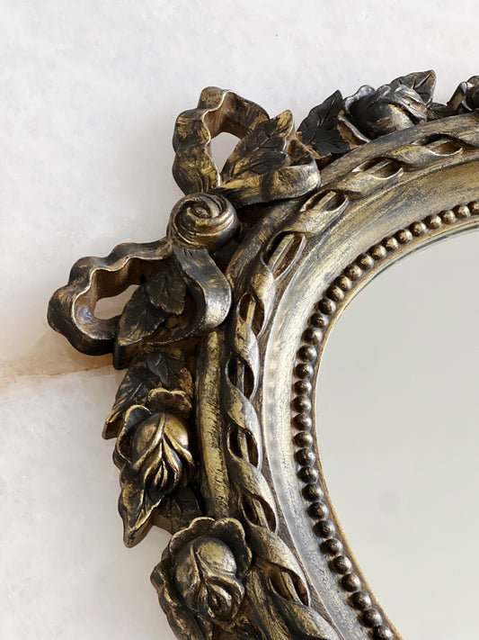Vintage gold bow mirror