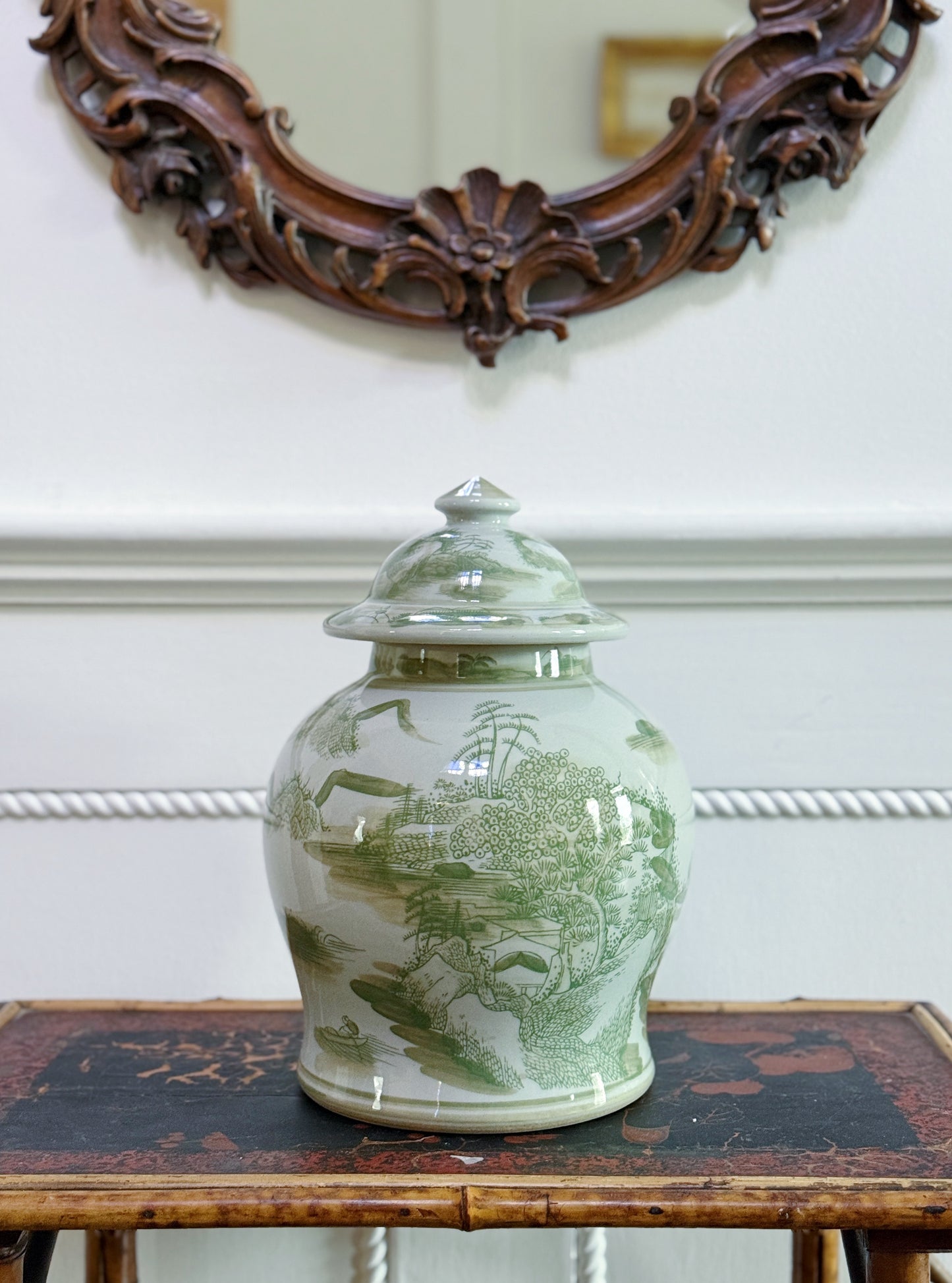Green & White Landscape Temple Jar on antique bamboo table with antique mirror