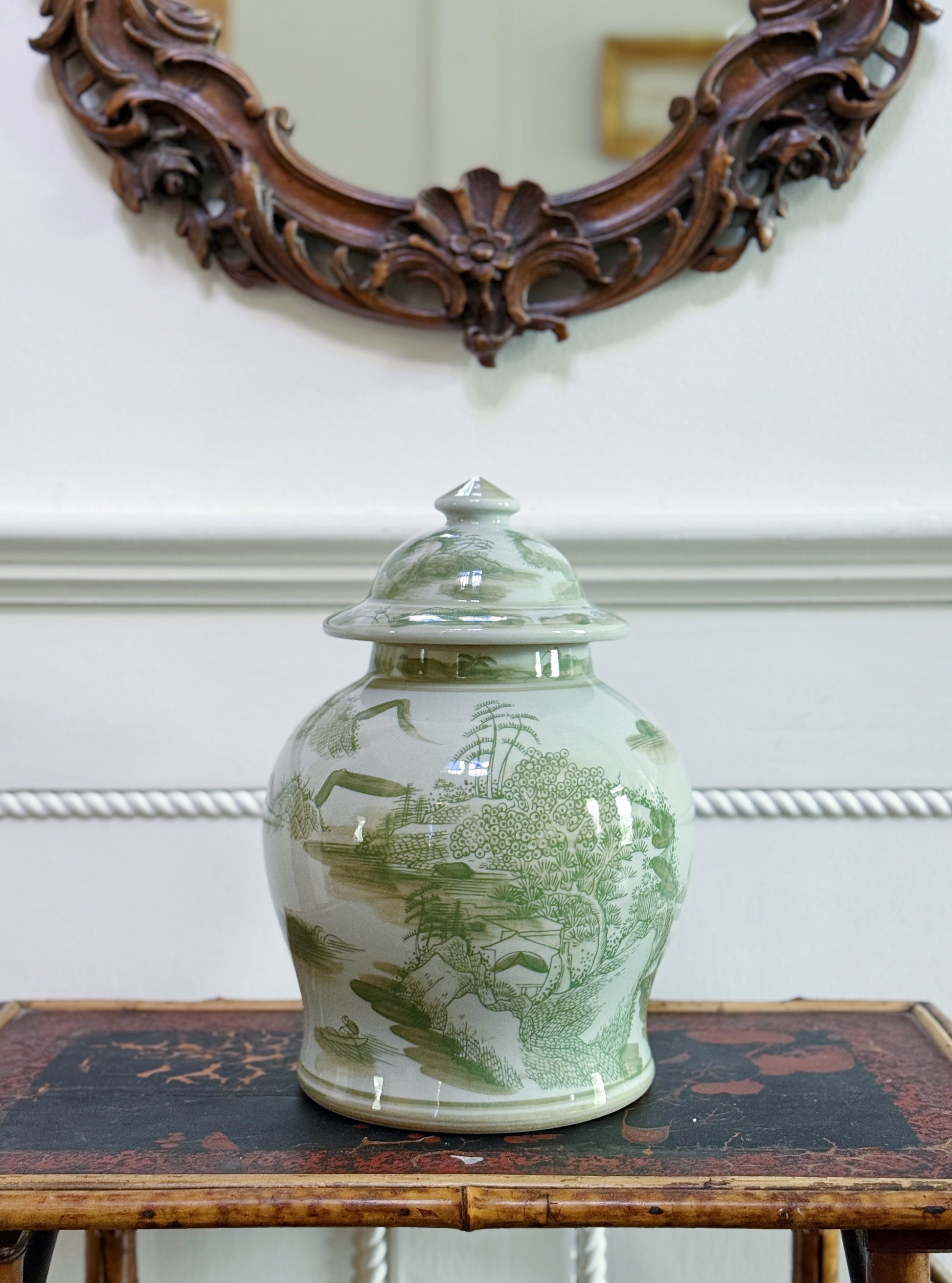 Green & White Landscape Temple Jar on antique bamboo table with antique mirror