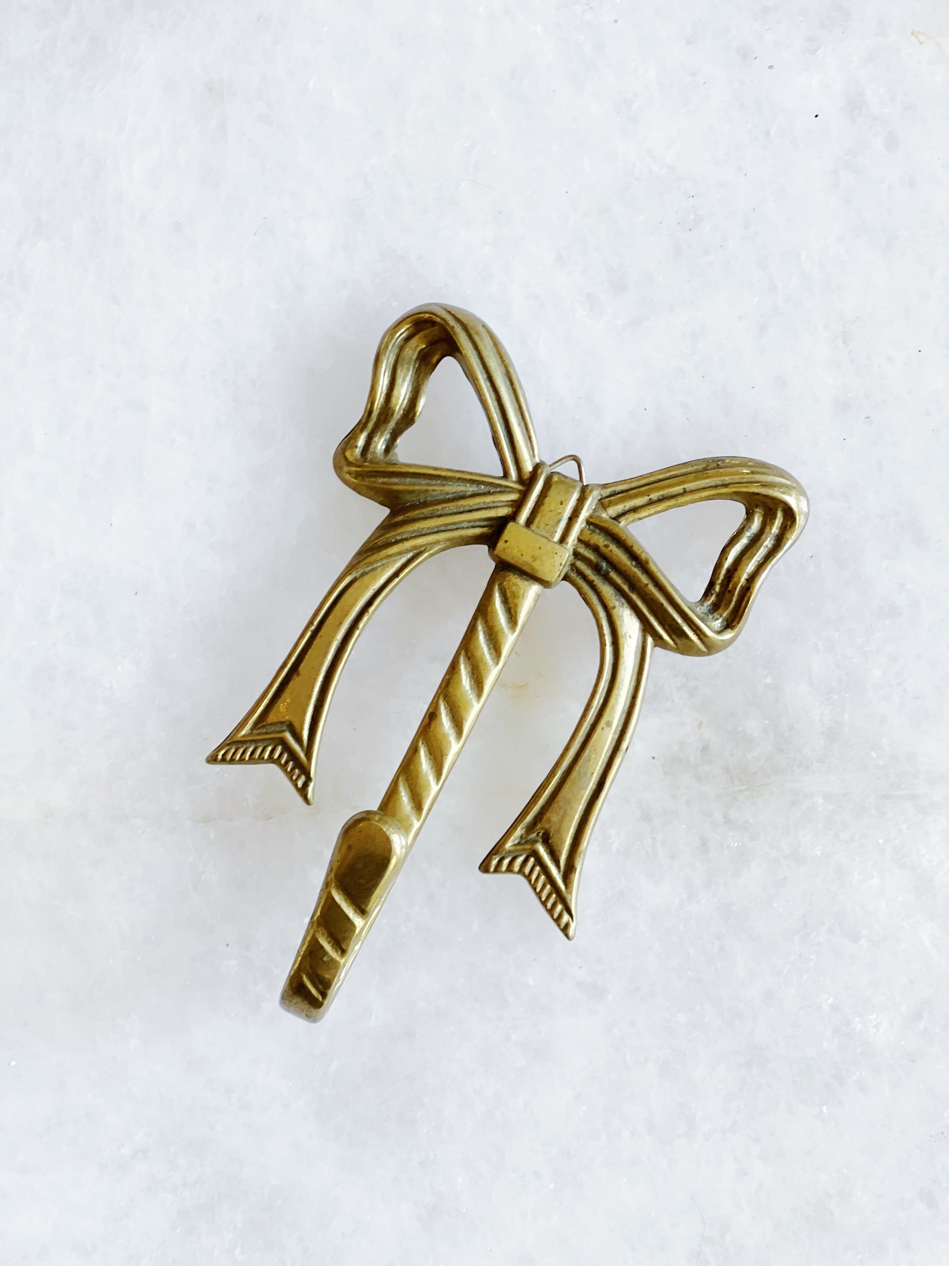 Vintage brass bow hook