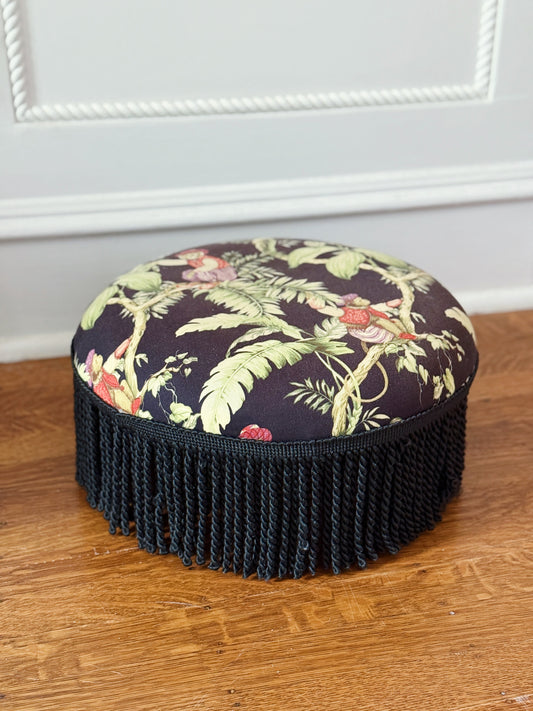 Vintage furniture upholstered foot stool with tassel trim