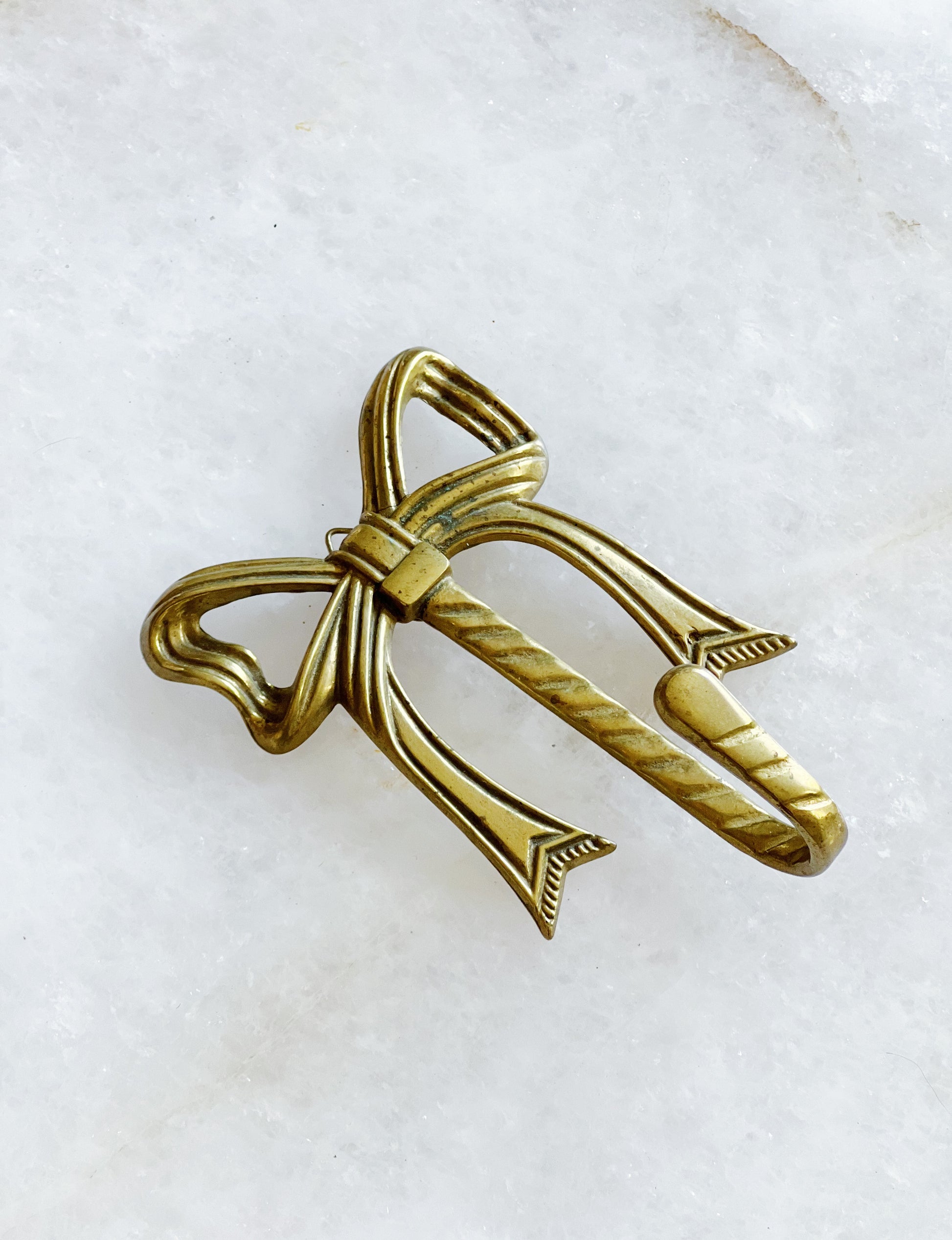Vintage brass bow hook 