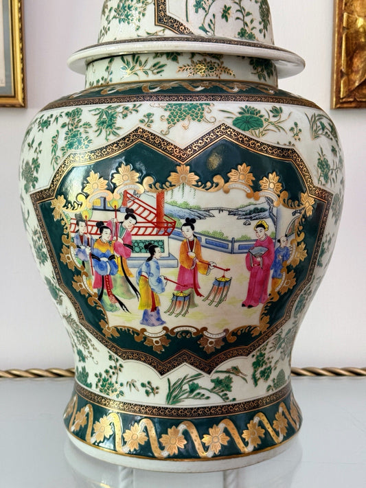Close-up of the figural garden scene panel on the green porcelain jar