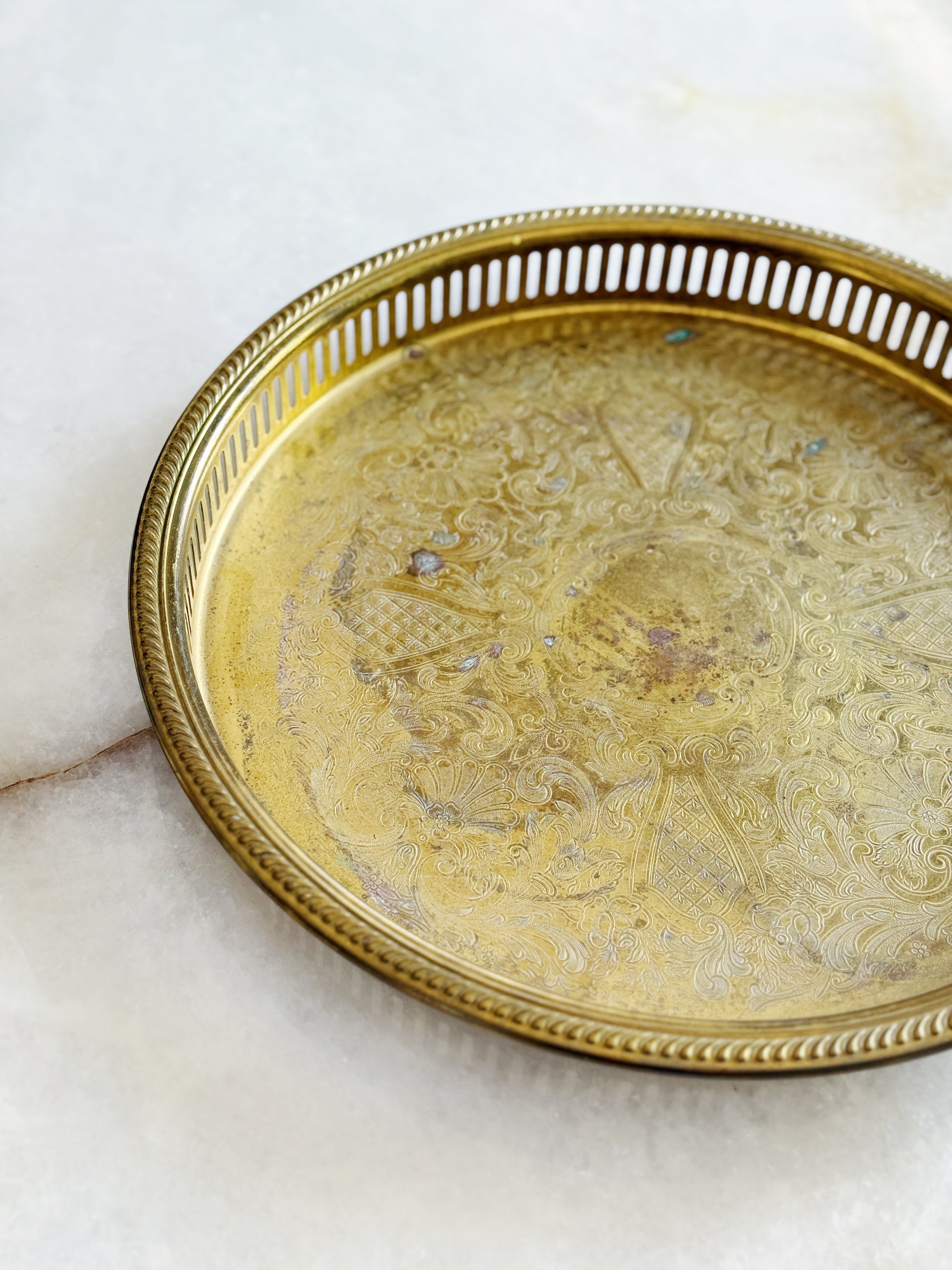Vintage brass serving tray with reticulated edges