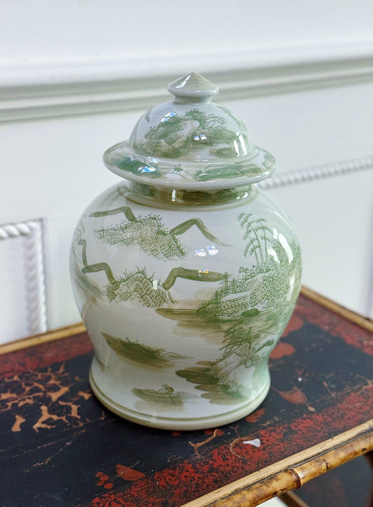Green & White Landscape Temple Jar on antique bamboo table with antique mirror
