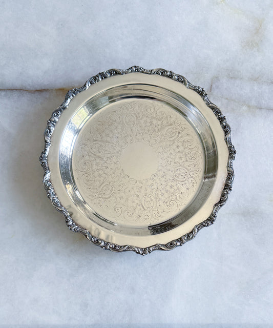 Vintage footed silver serving tray with etched design