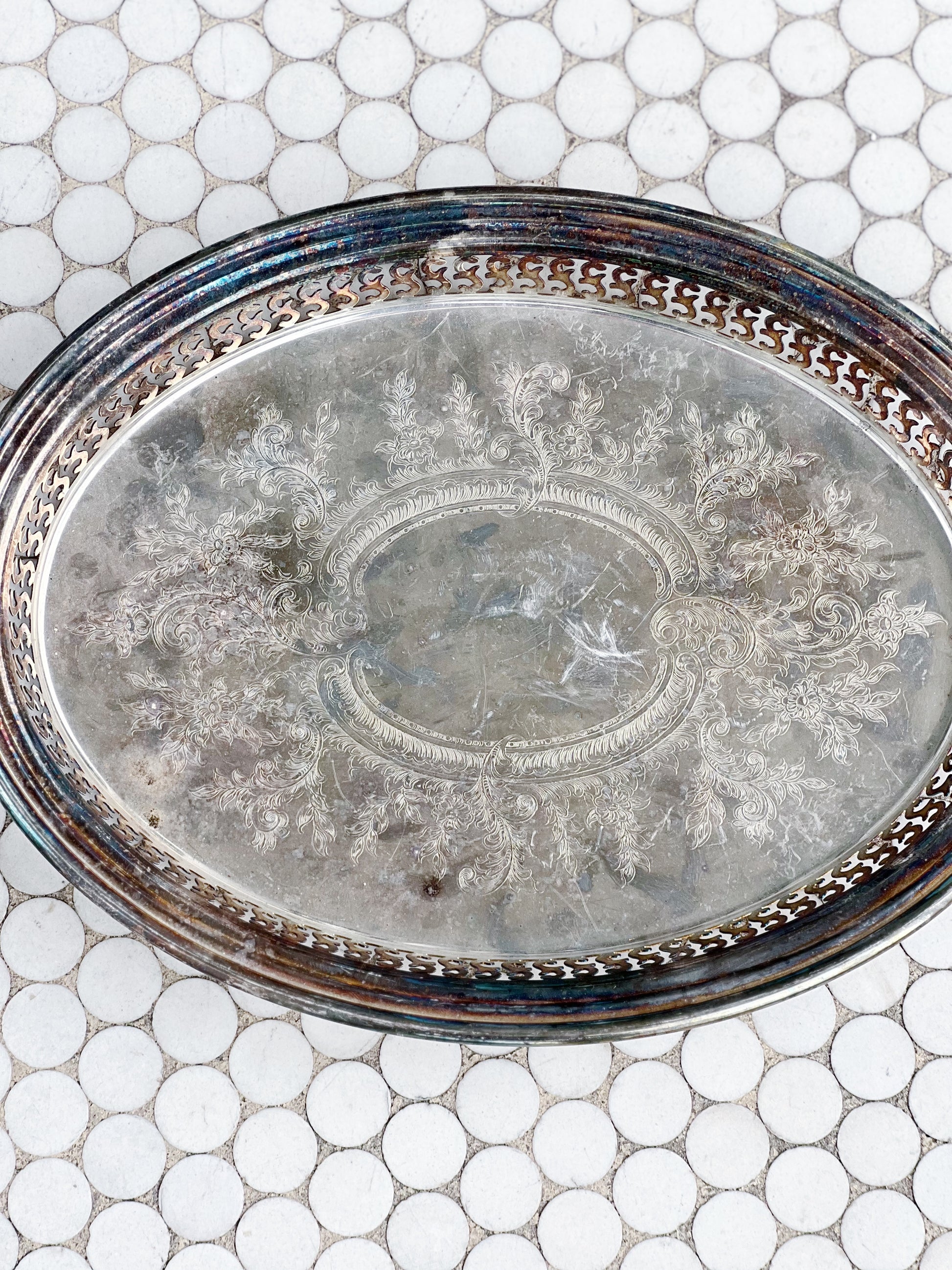 vintage oval silver drinks tray with etched detailing and reticulated sides