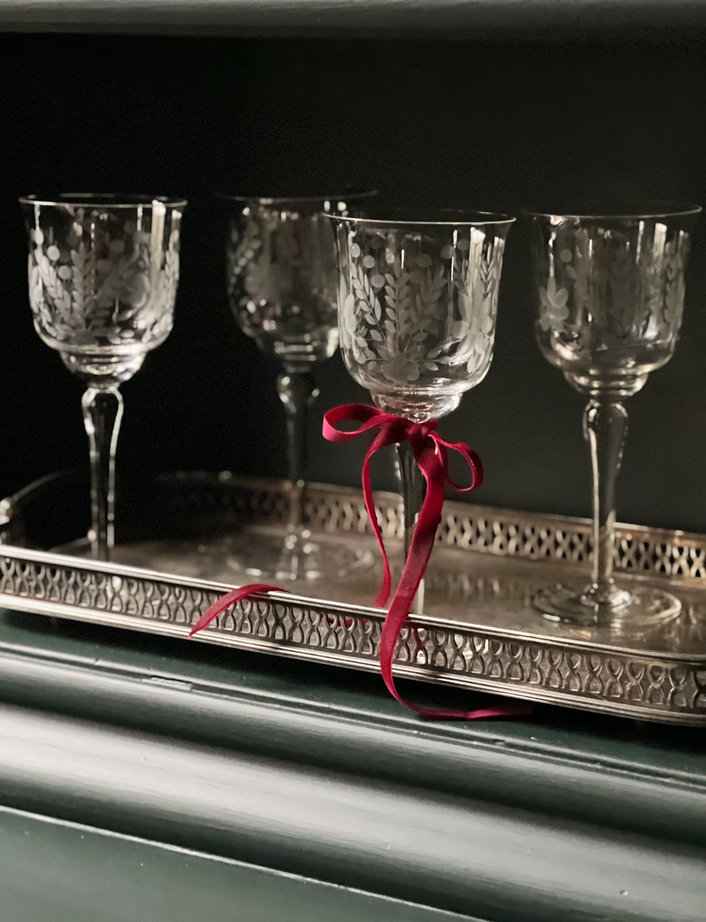 vintage etched wine glasses on a vintage silver serving tray