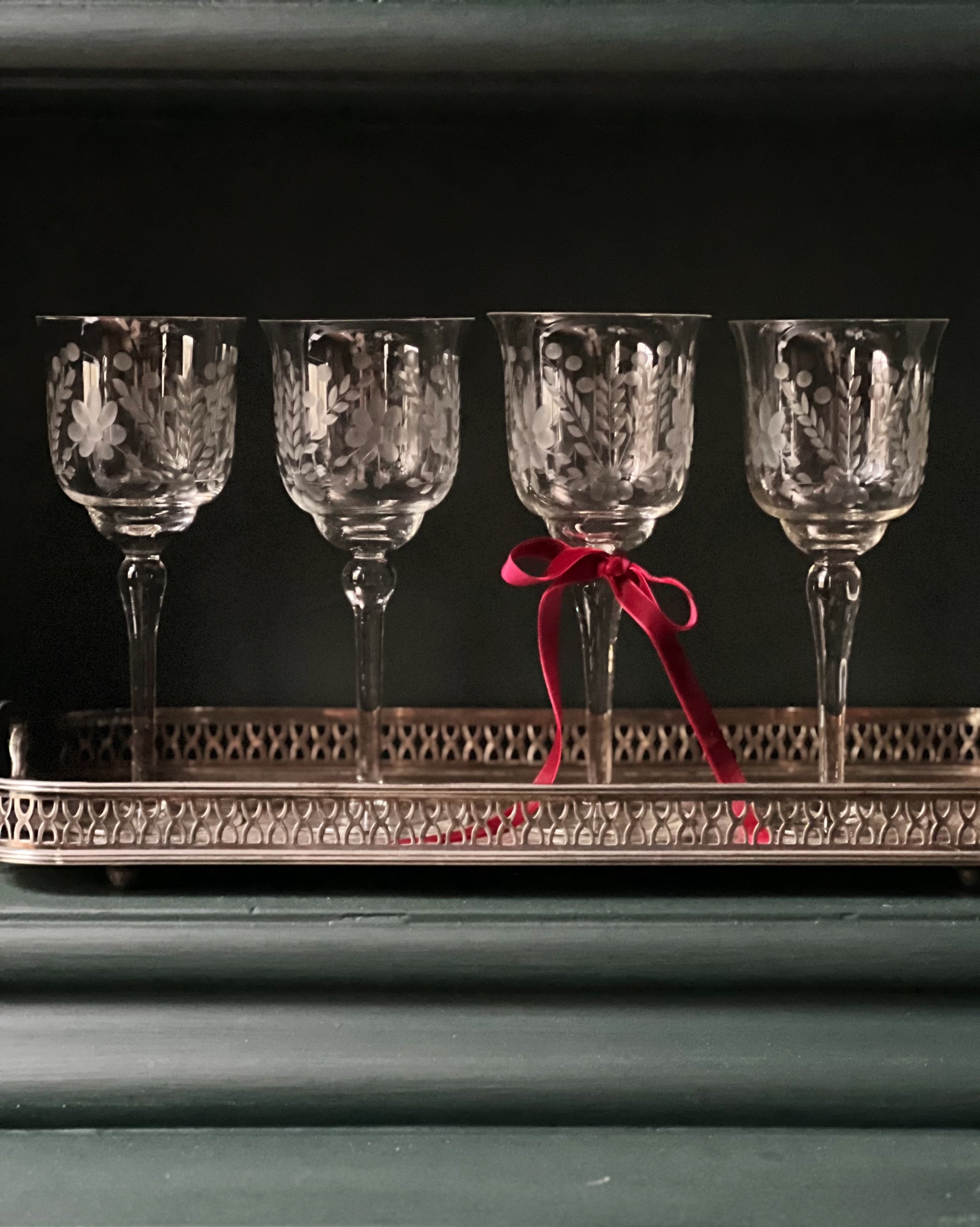vintage etched wine glasses on a vintage silver serving tray