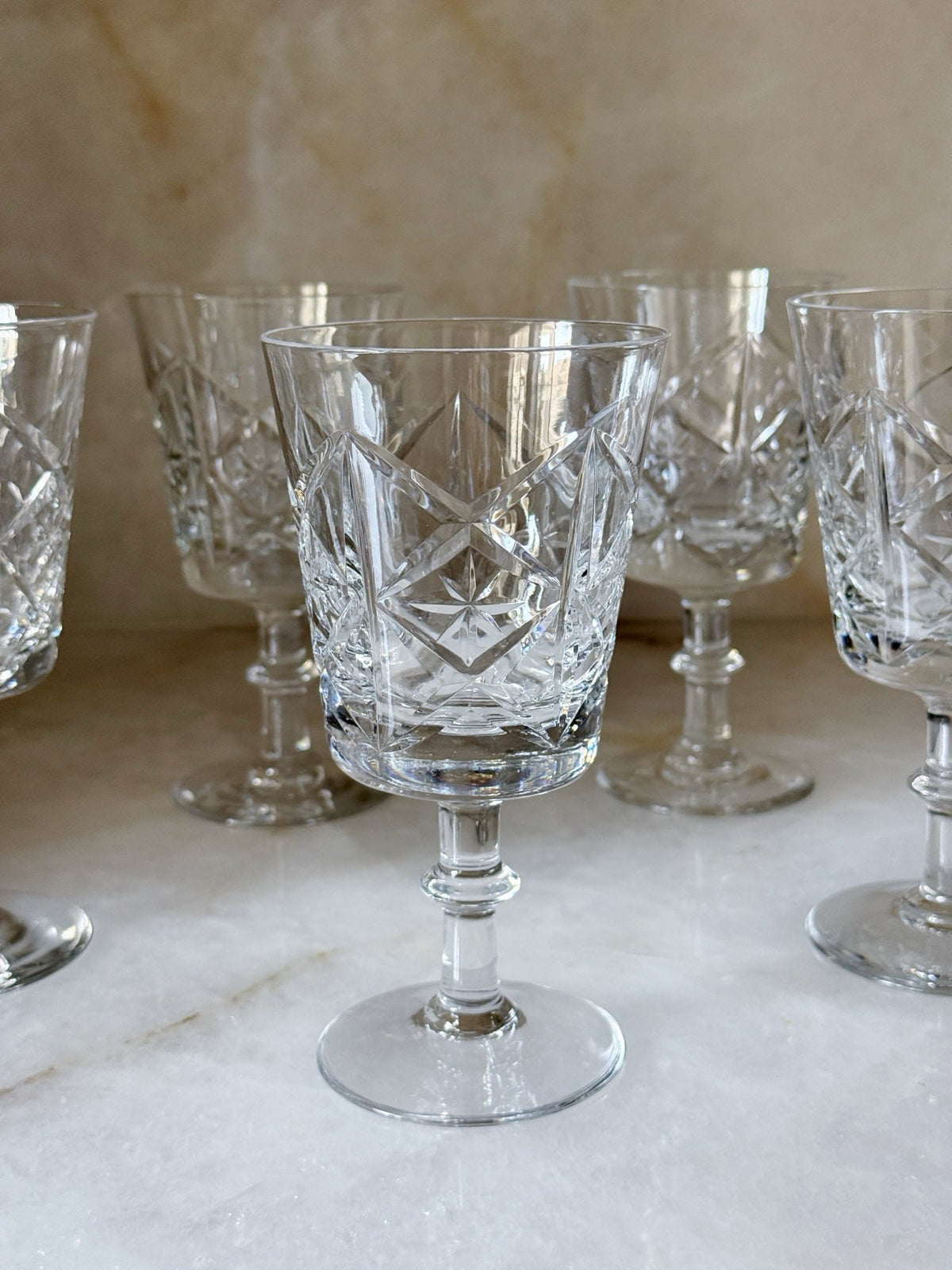 Close-up of a vintage glass starburst wine goblet